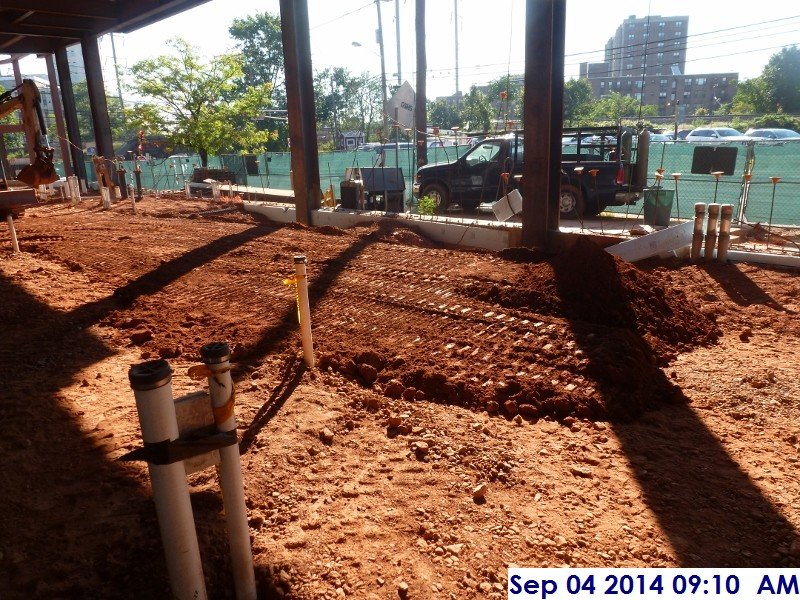 Continued grading soil along foundation walls Facing South-East (800x600)